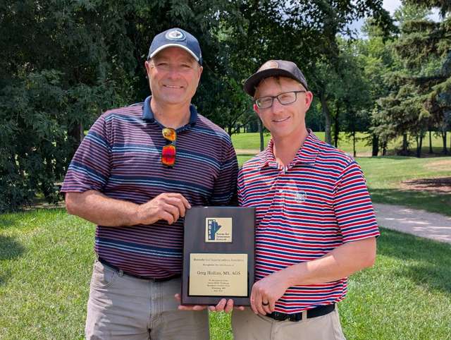 Images/2026 Jarret Rempel, AAGS (right) presenting Greg Hollins, MS, AGS (left), with his plaque for hosting the Golf Manitoba Junior Skills Challenge. Images/2026 Jarret Rempel, AAGS (right) presenting Greg Hollins, MS, AGS (left), with his plaque for hosting the Golf Manitoba Junior Skills Challenge.